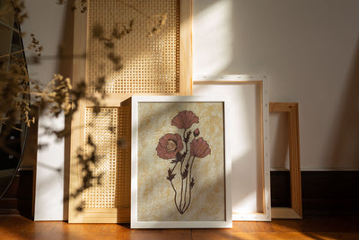 fine art print of a poppy flower with a human face in one of the blooms on a textured background