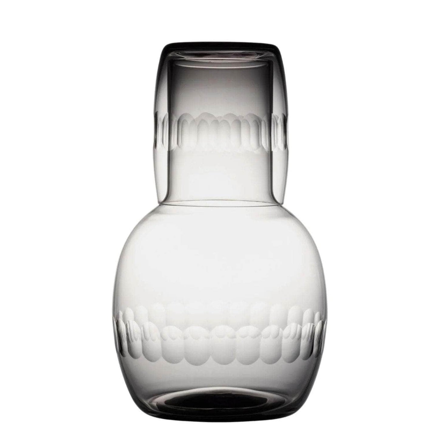 A smoky crystal carafe set with lens design