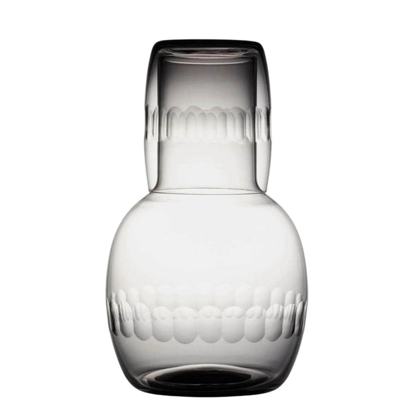 A smoky crystal carafe set with lens design