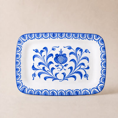 Rectangular plate with blue floral design on a beige background