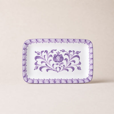 Rectangular plate with purple floral design on a beige background