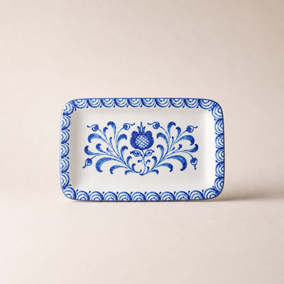 Rectangular tray with blue floral pattern on a beige background