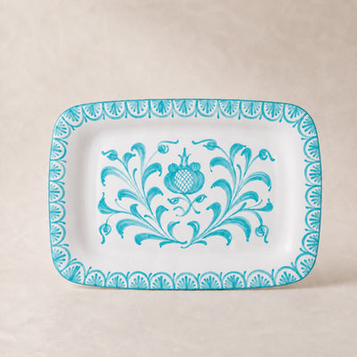 Rectangular plate with blue floral design on a beige background