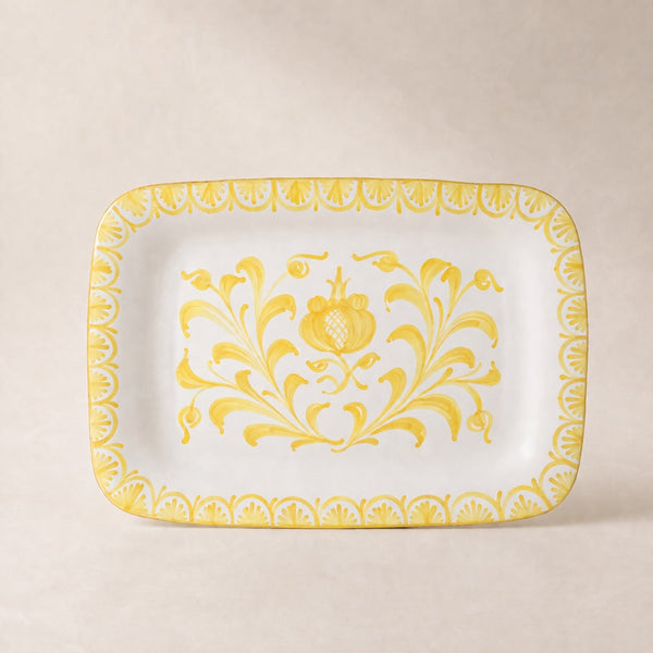Rectangular plate with yellow floral pattern on a beige background
