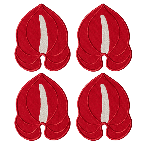 Octaevo's Red Anthurium Coasters (Set of 4) feature bold petal shapes on linen-cotton, arranged in a grid.
