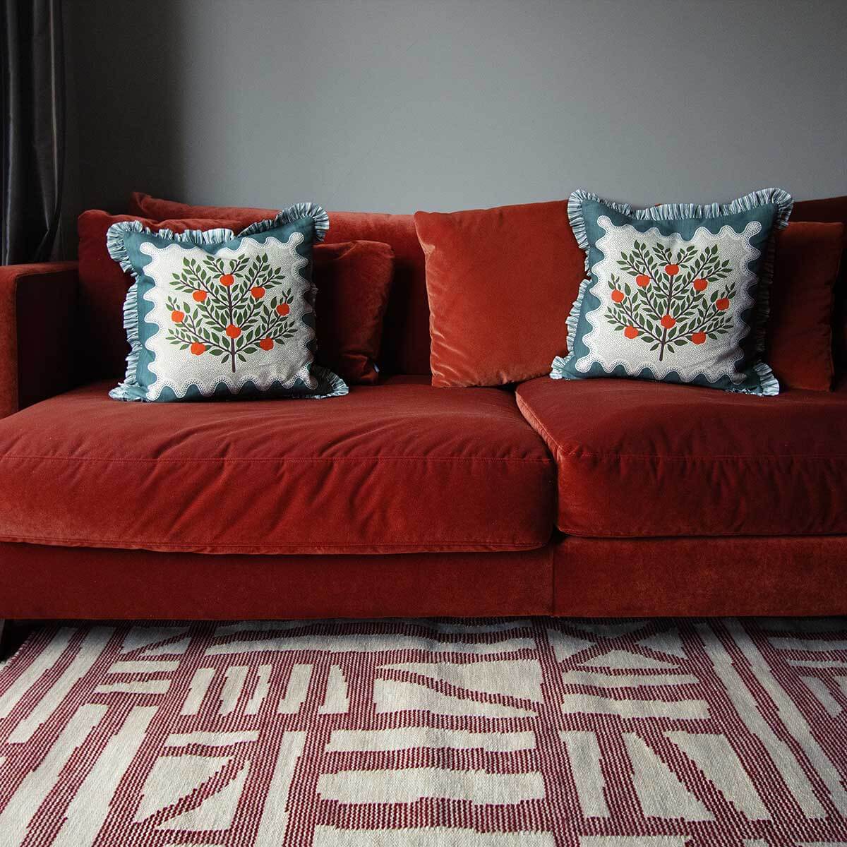 Living room with Red tudor flatweave rug 