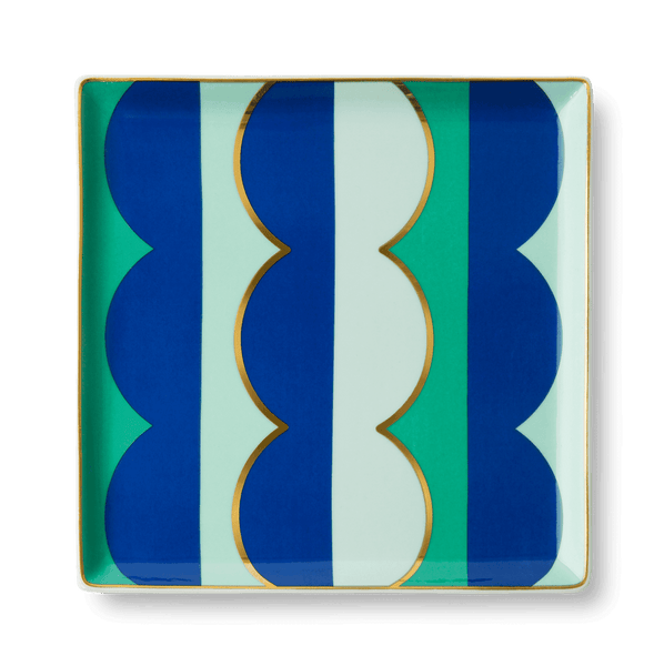 The OCTAEVO Riviera Wave Ceramic Tray features bold blue, green, and gold patterns—perfect for a stylish tablescape.