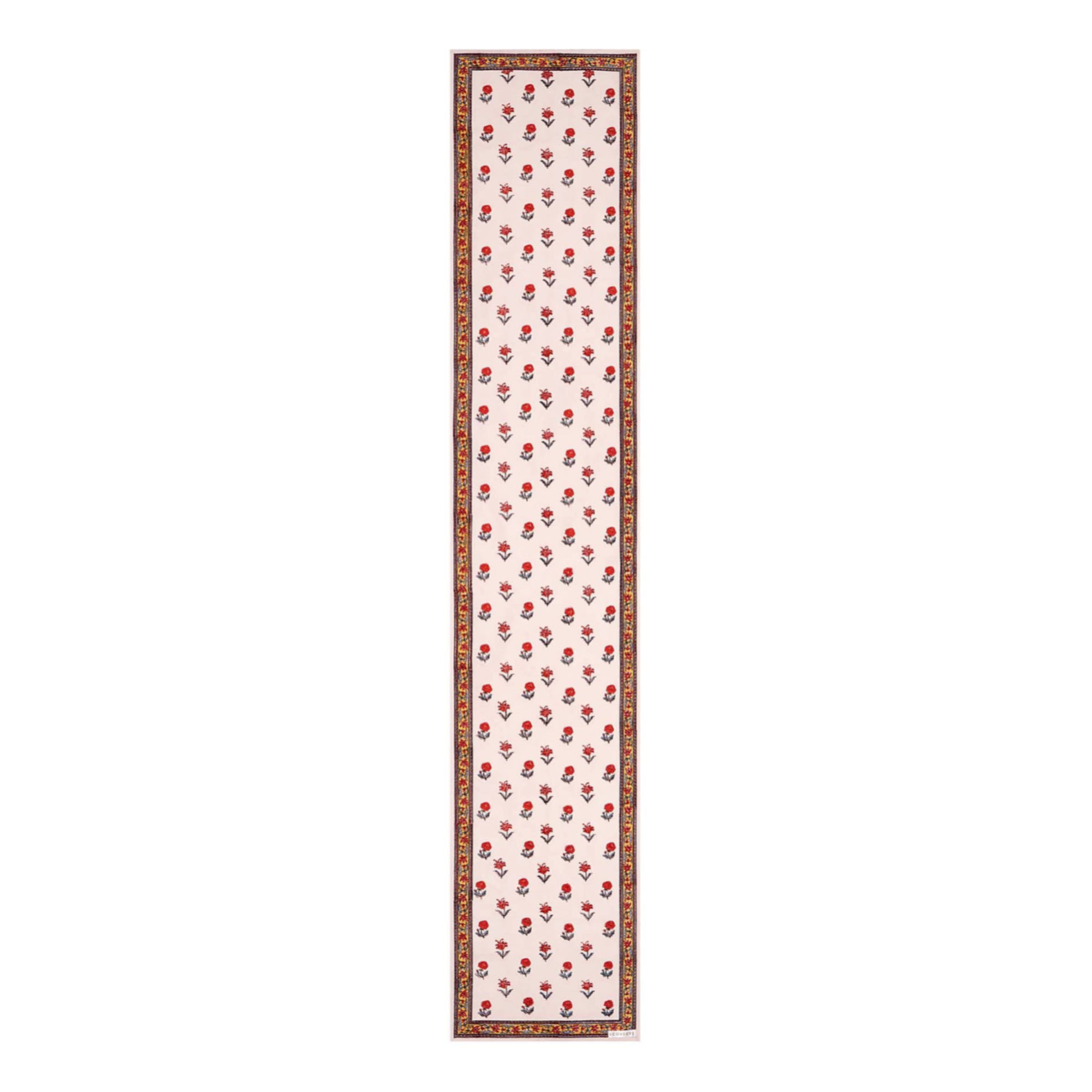 Block printed floral design table runner with border in reds, whites and yellows