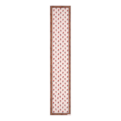 Block printed floral design table runner with border in reds, whites and yellows