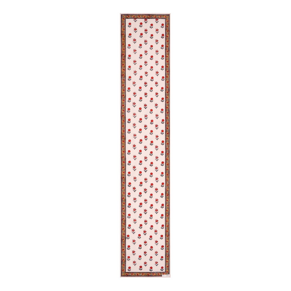 Block printed floral design table runner with border in reds, whites and yellows