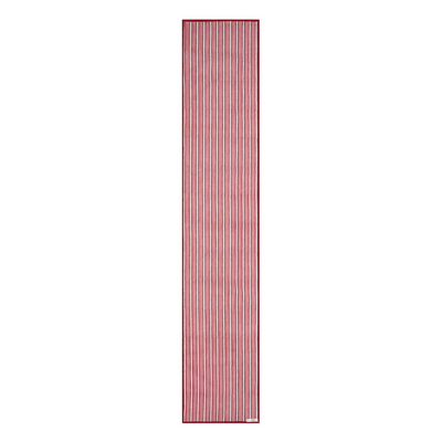 A striped cotton table runner with a classic design, predominantly in red and white colors, displayed on a table.