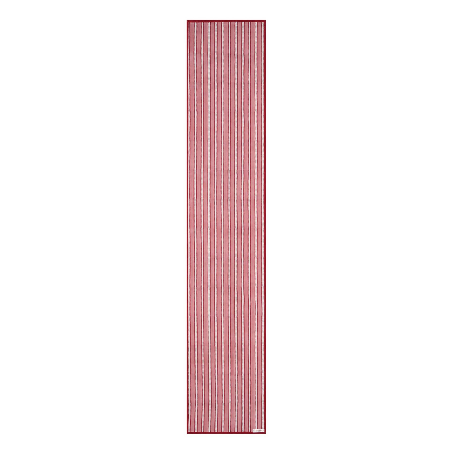 A striped cotton table runner with a classic design, predominantly in red and white colors, displayed on a table.