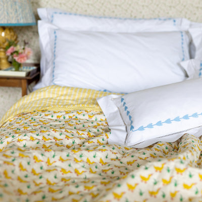 Yellow ducks block printed quilt