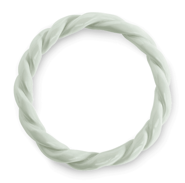 The OCTAEVO Sicilia Ceramic Trivet features a circular, twisted light mint design on a transparent background.
