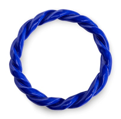 The Sicilia Ceramic Trivet by OCTAEVO features a twisted blue design in a circular wreath shape on a white background.