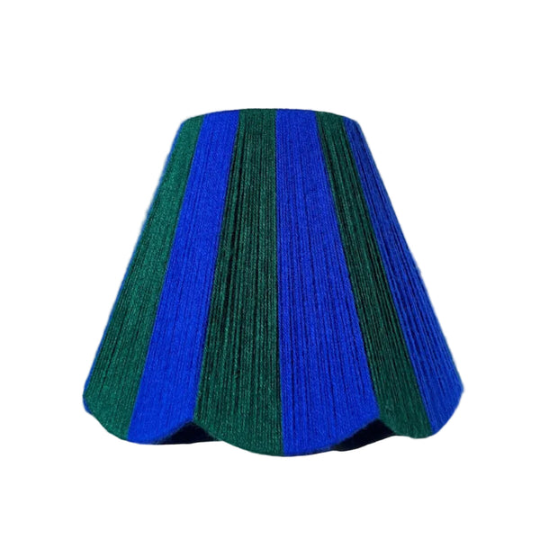 A Slice Shades handwoven yarn striped Scallop Lampshade in the sun in Cobalt Blue & Emerald Green.
