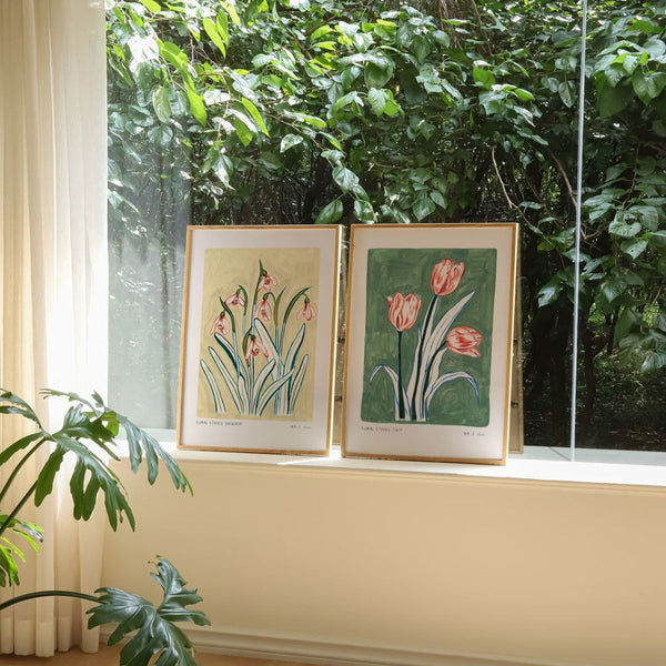 Snowdrop art print paired and styled next to our turquoise and pink tulip print.