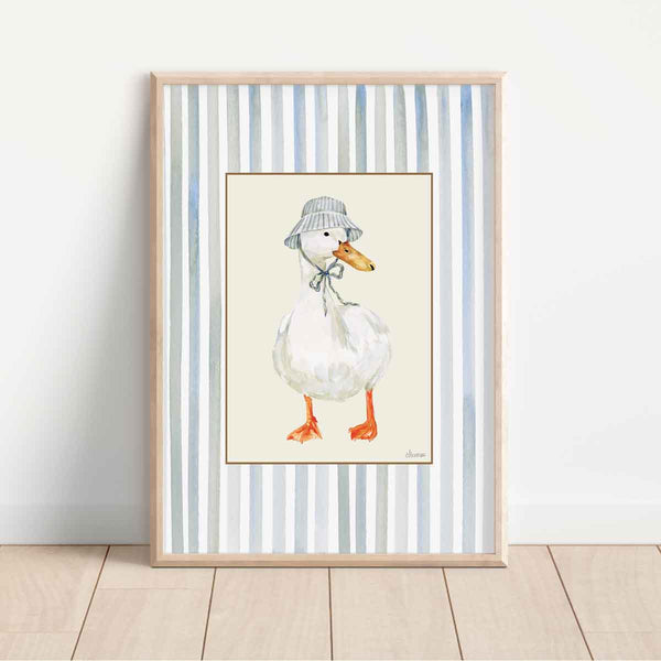 white duck wearing vintage striped bucket hat, on butter yellow rectangle on striped blue background. Perfect for nursery room walls. 