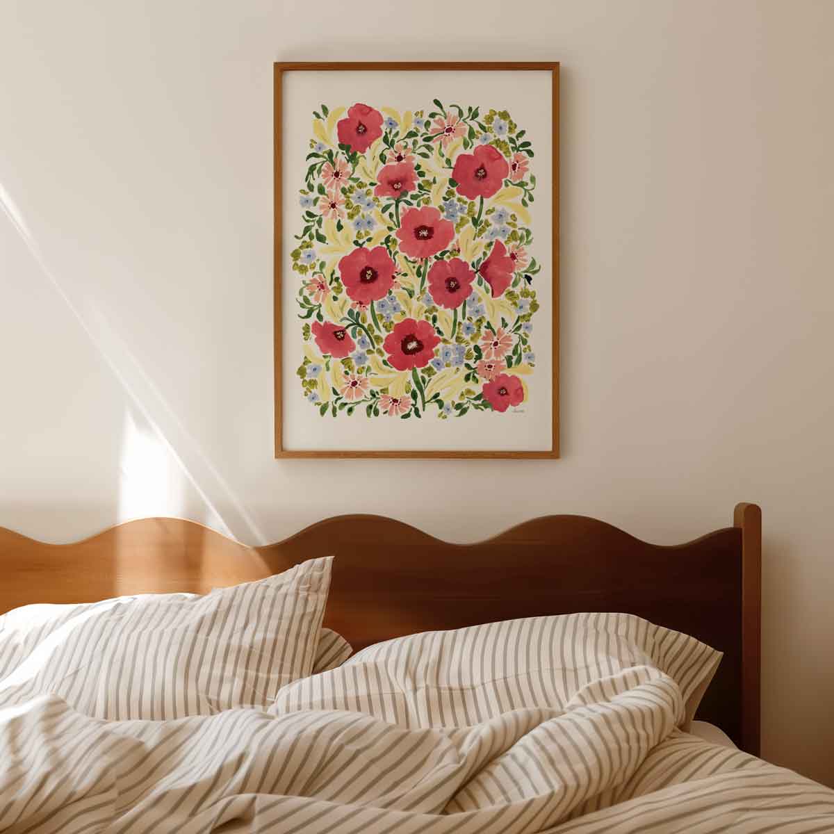 watercolour hand painted poppy floral design, bright pinks, lilacs, butter yellow and greenery fine art print styled in A2 in bedroom with oak frame