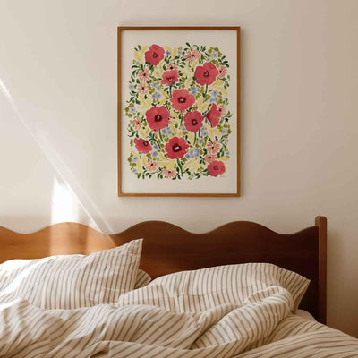 watercolour hand painted poppy floral design, bright pinks, lilacs, butter yellow and greenery fine art print styled in A2 in bedroom with oak frame