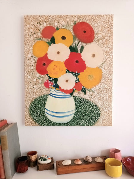 oil painting of flowers in the vase seen on wall