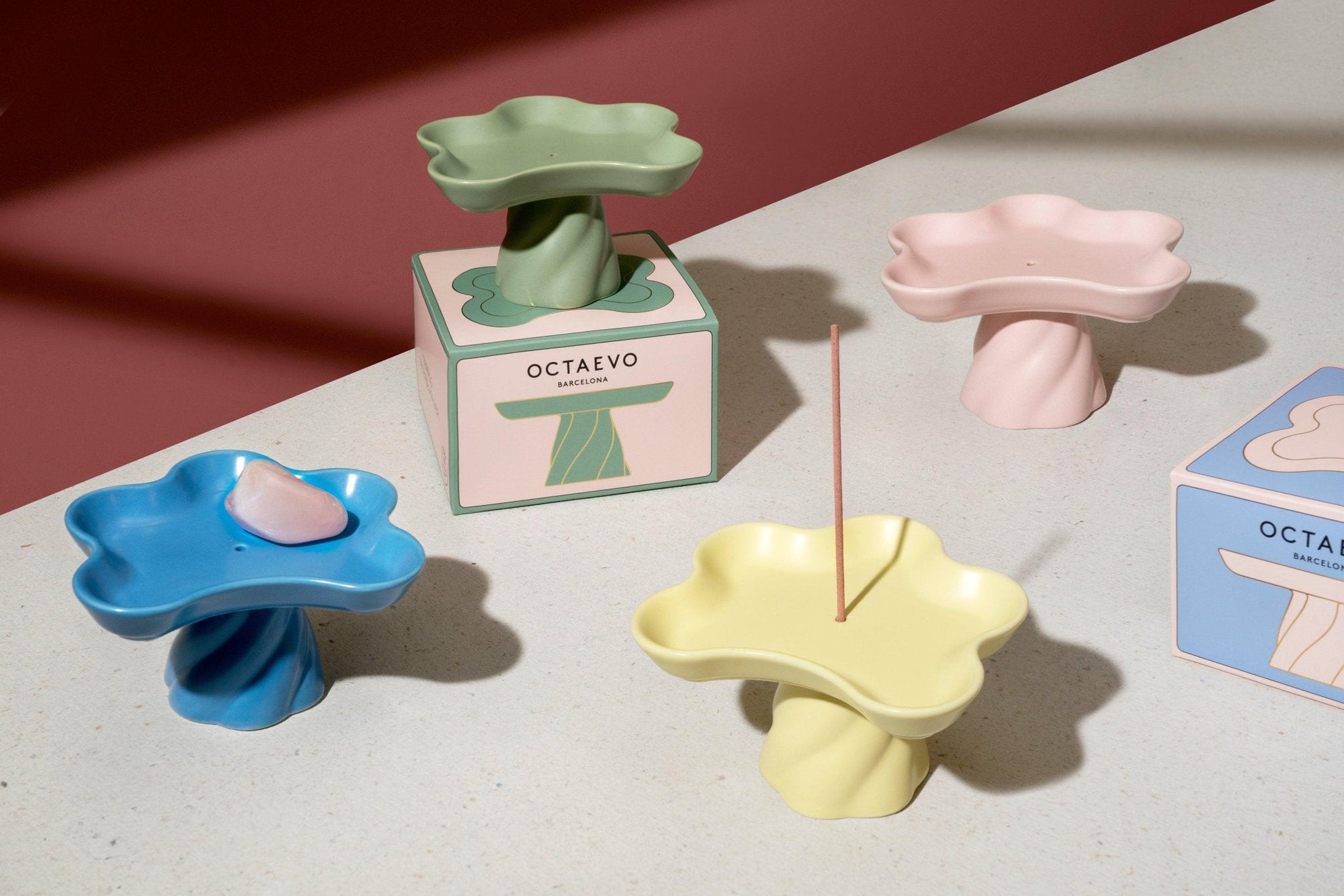 Four colorful Templo Incense Holders by Octaevo are displayed with pastel boxes on a light surface.