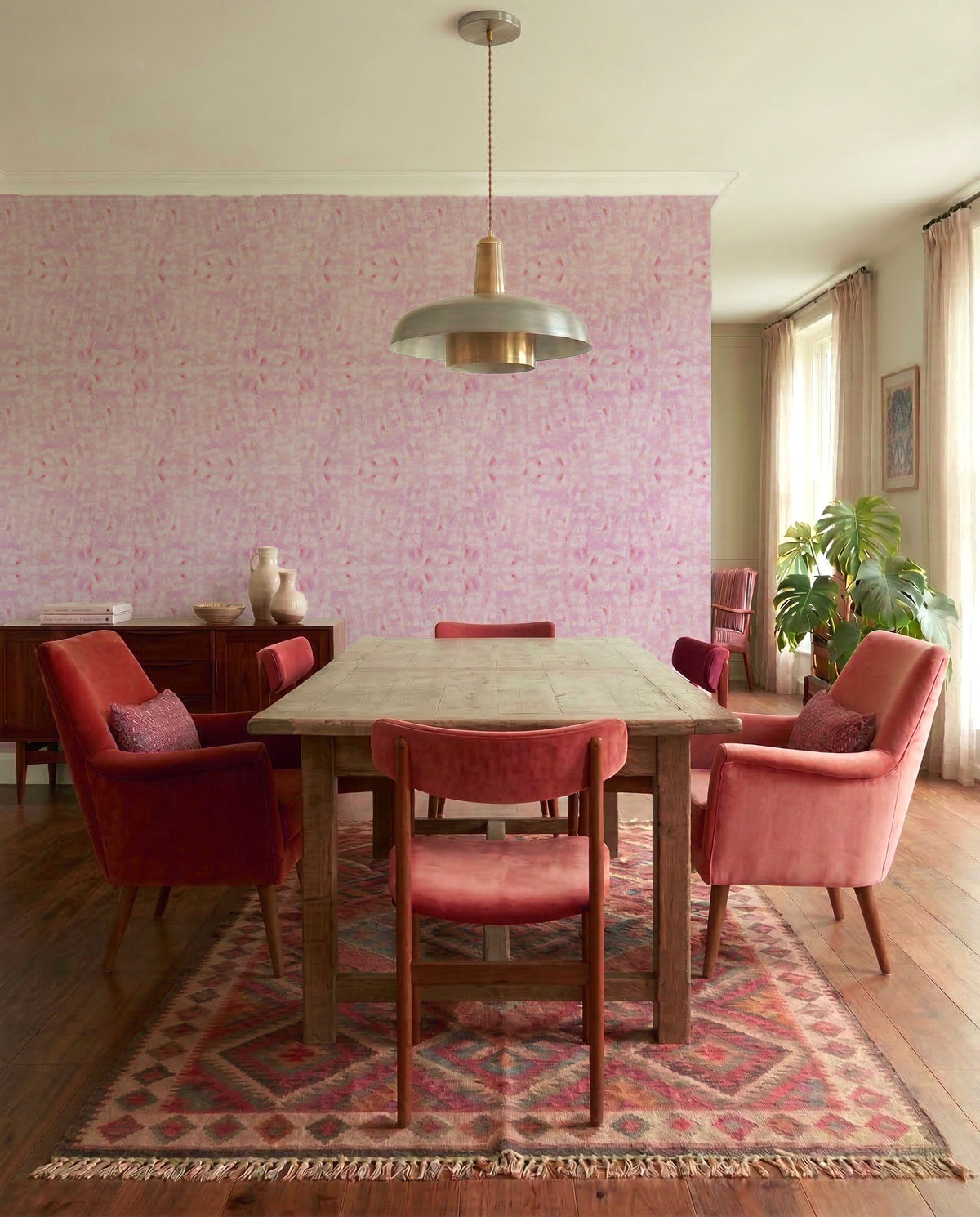 mid century dining room with pink watercolor abstract wallpaper