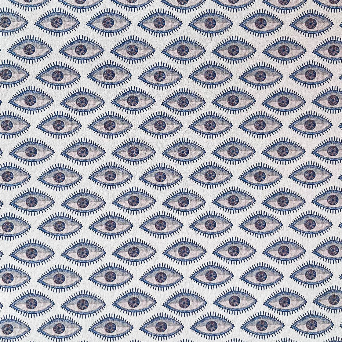 Evil eye wallpaper close up blue beige