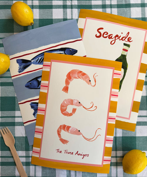 "The Three Amigos" playful art print of three prawns framed by a bold striped border with the collection