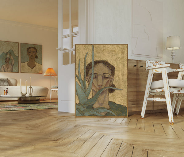 three huge art prints of women portraits in a livingroom