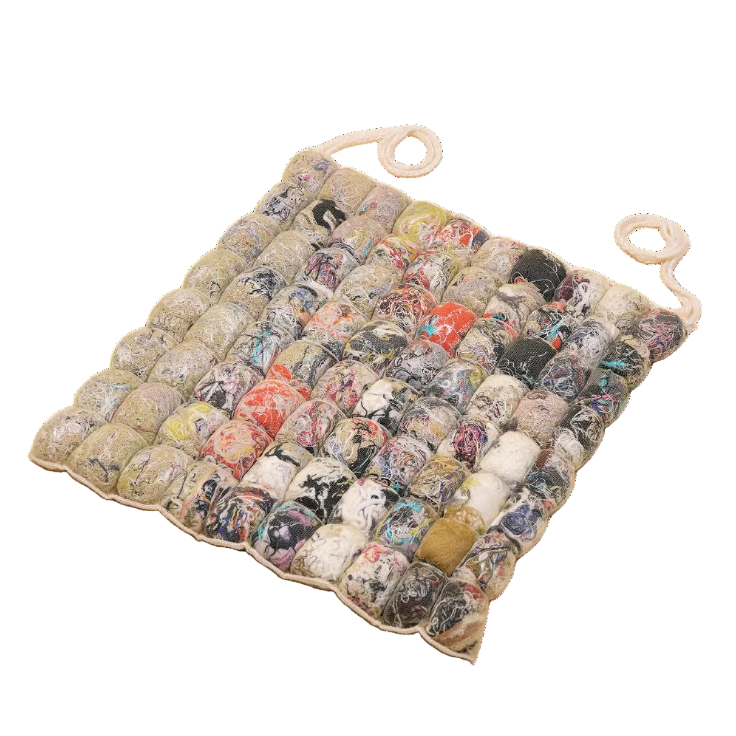 front view of knit seat cushion with transparent cover filled with upcycled materials
