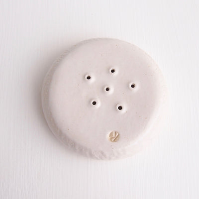underside white satin pottery soap dish