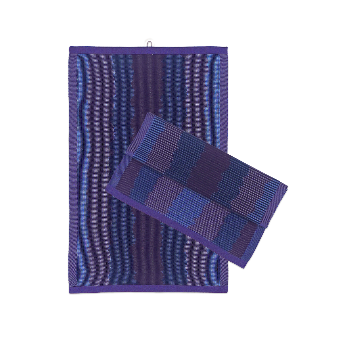 front view of purple knit organic cotton kitchen towel set with wavy pattern