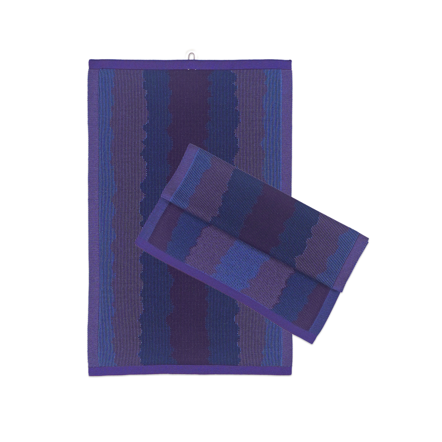 front view of purple knit organic cotton kitchen towel set with wavy pattern