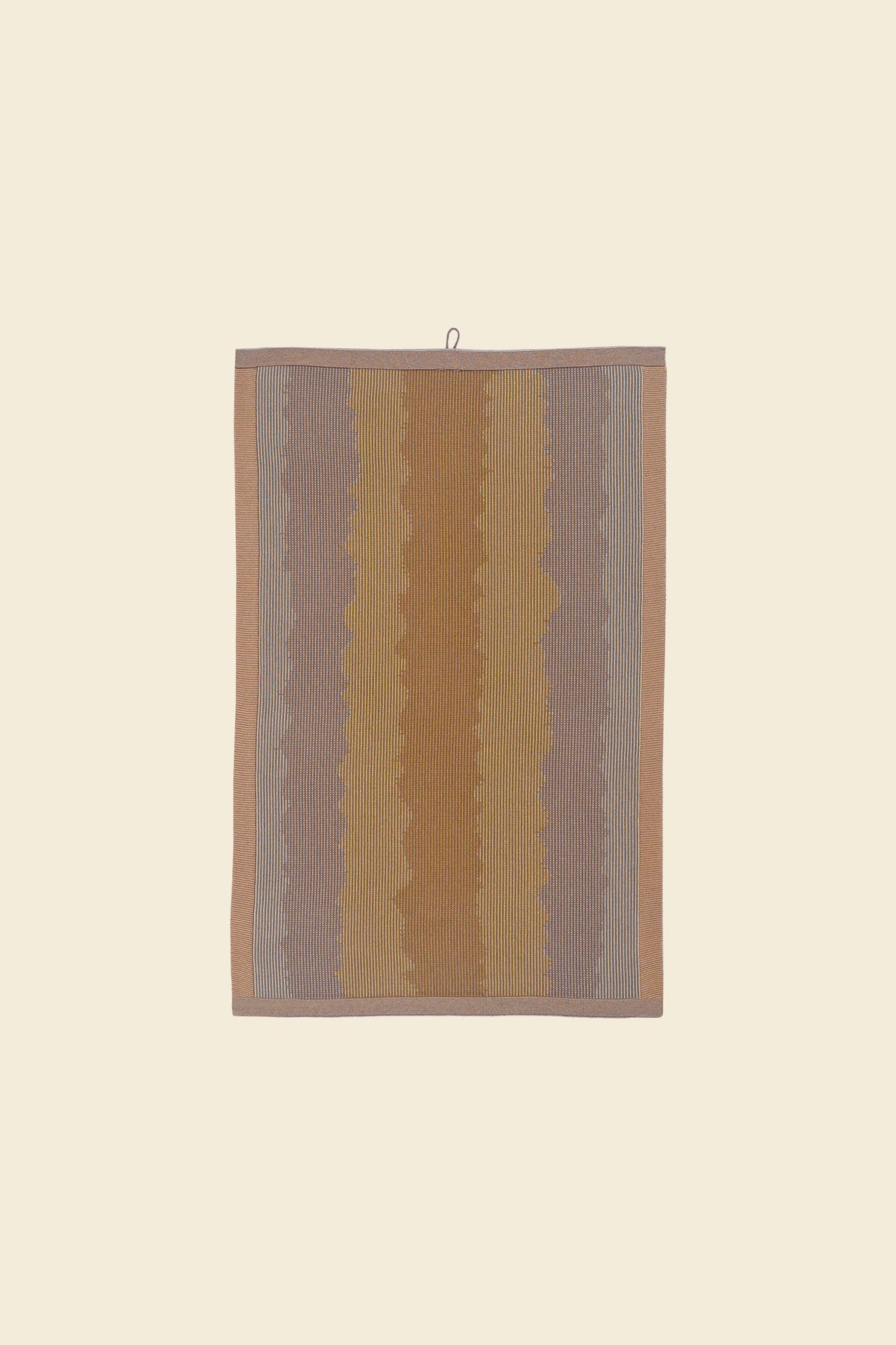 front of yellow knit organic cotton kitchen towel with wavy pattern
