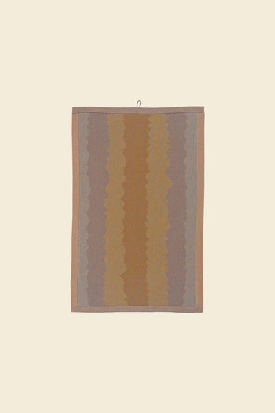 front of yellow knit organic cotton kitchen towel with wavy pattern