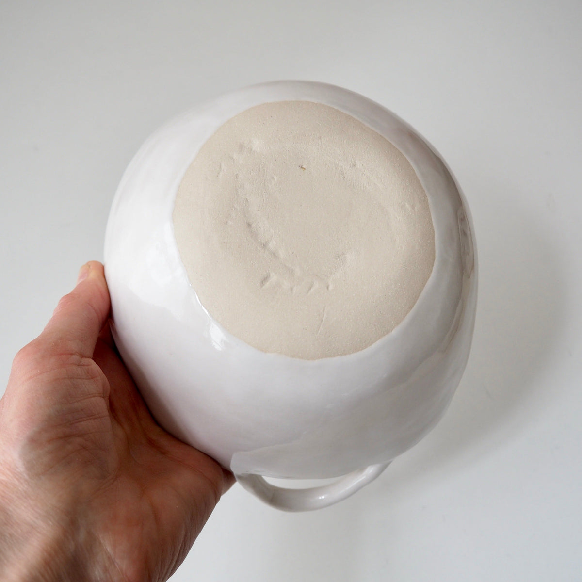 white ceramic bowl with handles