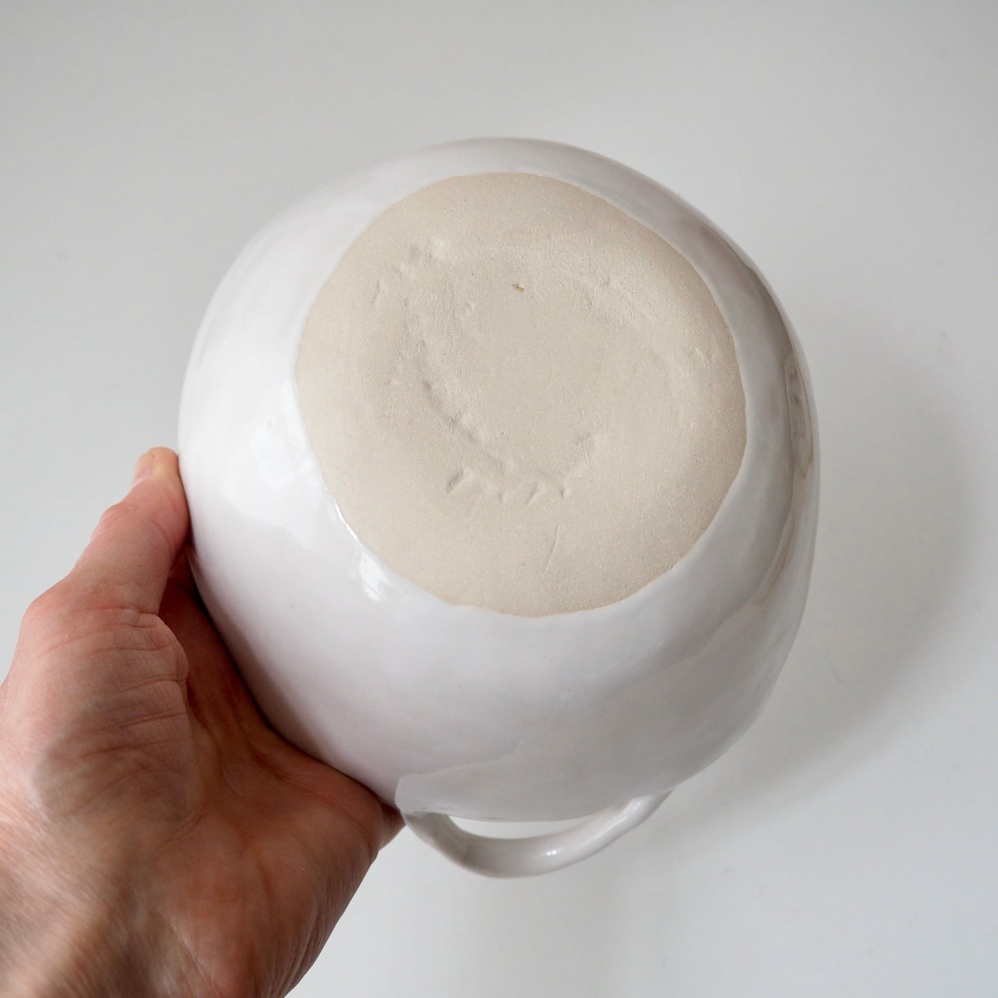white ceramic bowl with handles