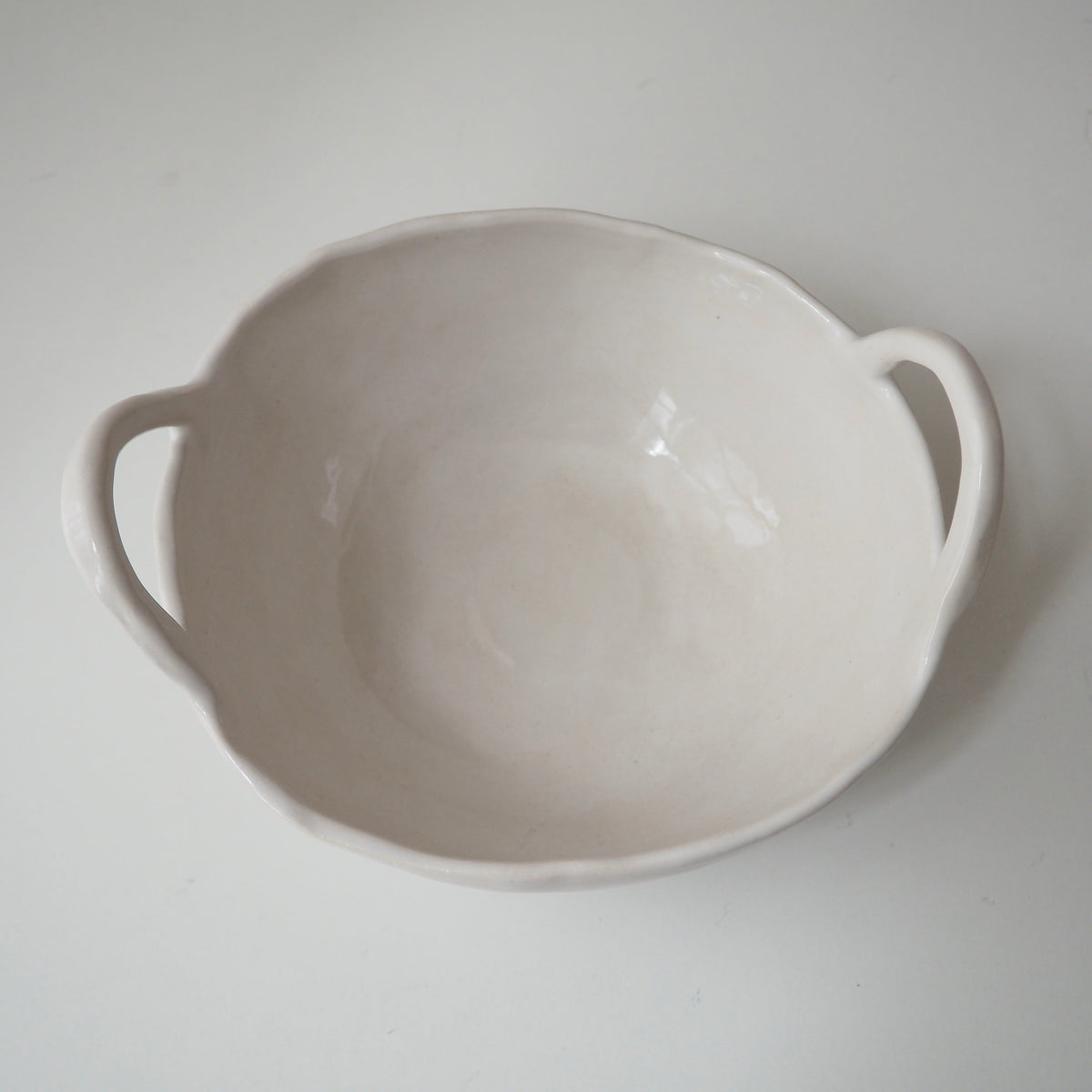 white ceramic bowl with handles