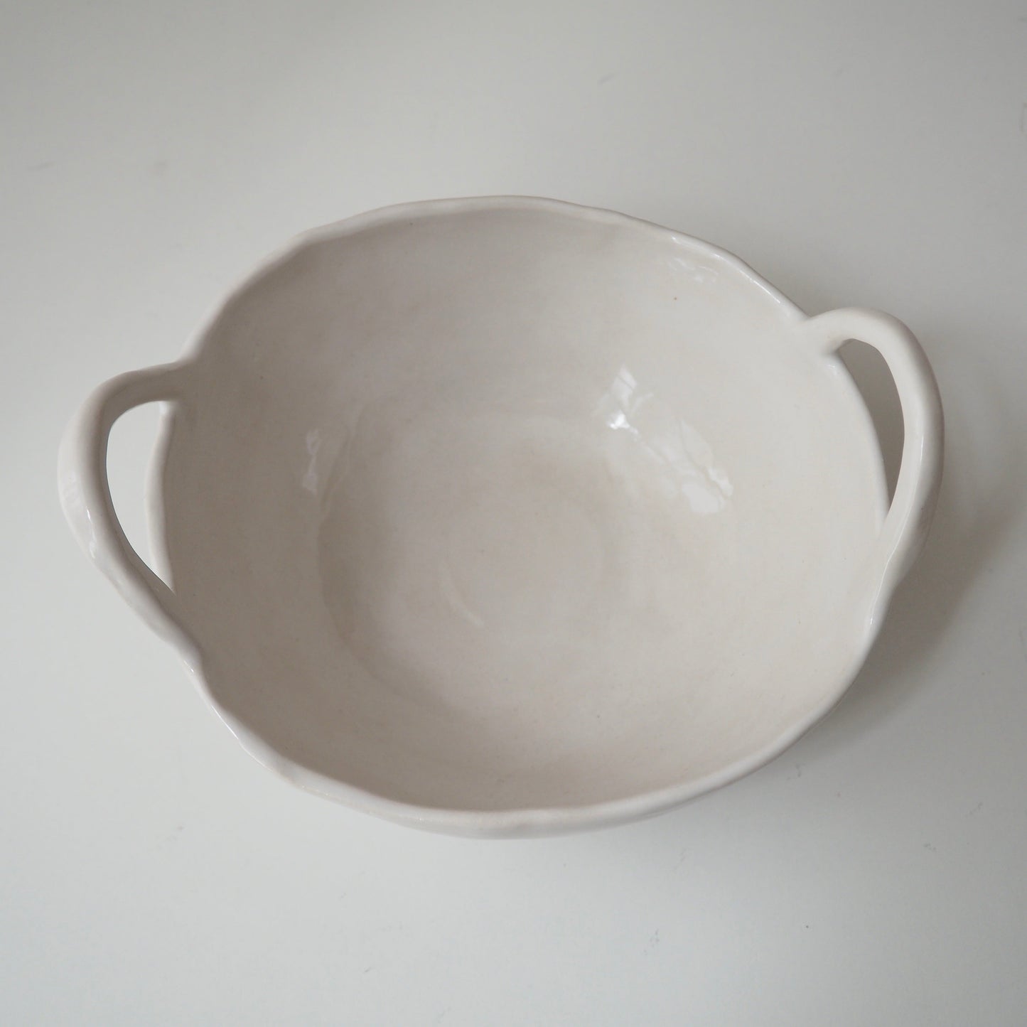 white ceramic bowl with handles