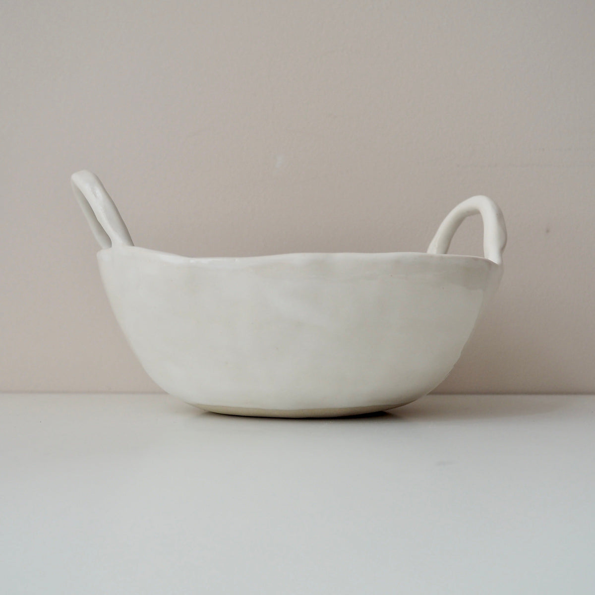 white ceramic bowl with handles