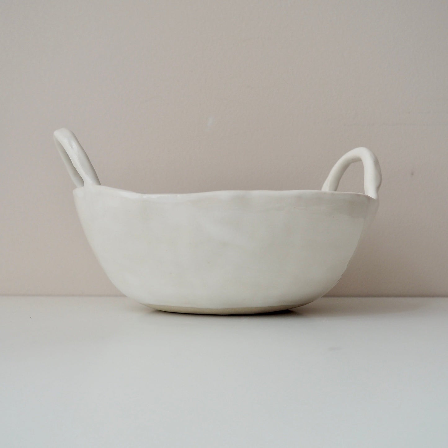 white ceramic bowl with handles