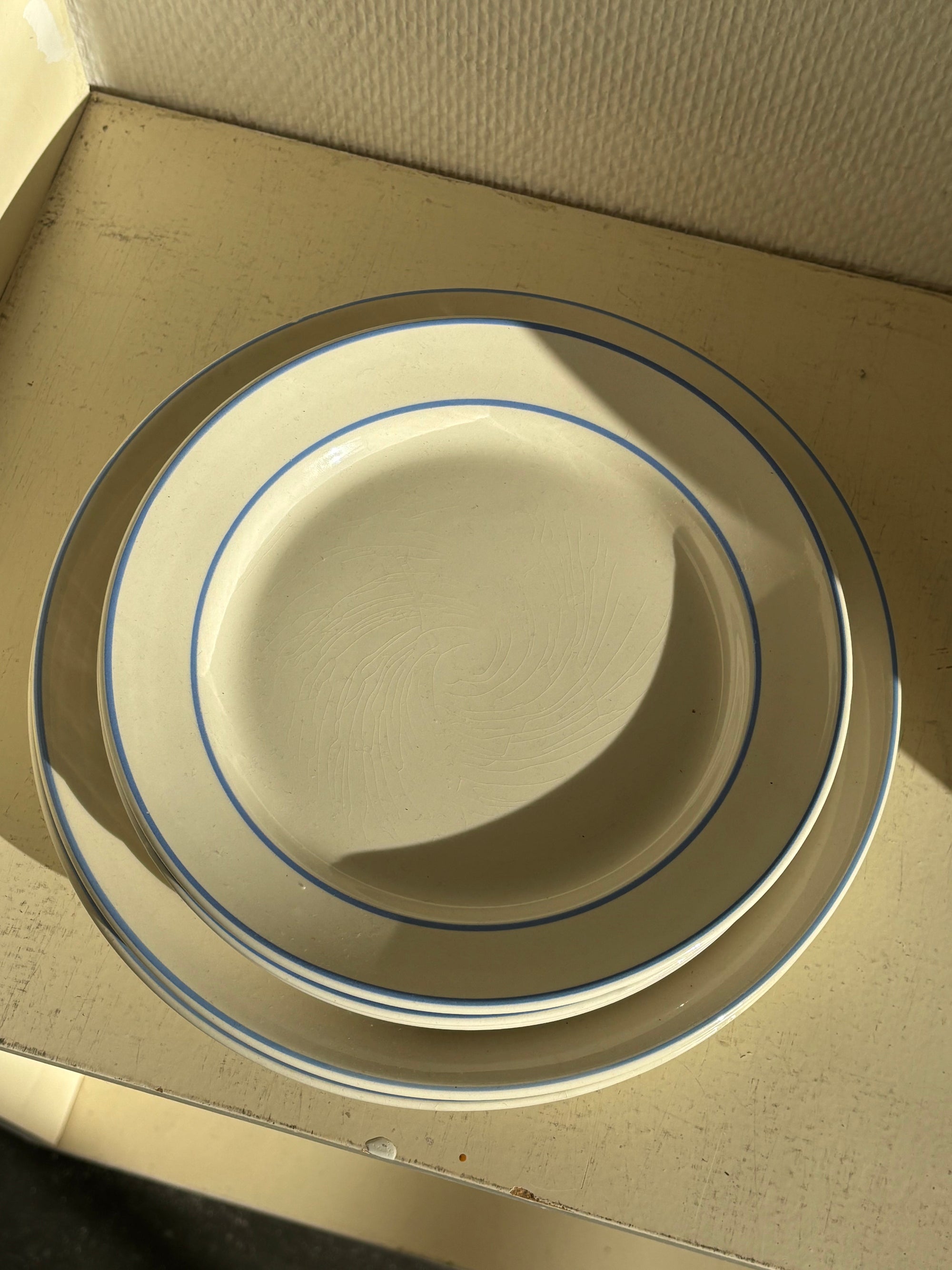 Five White Plates