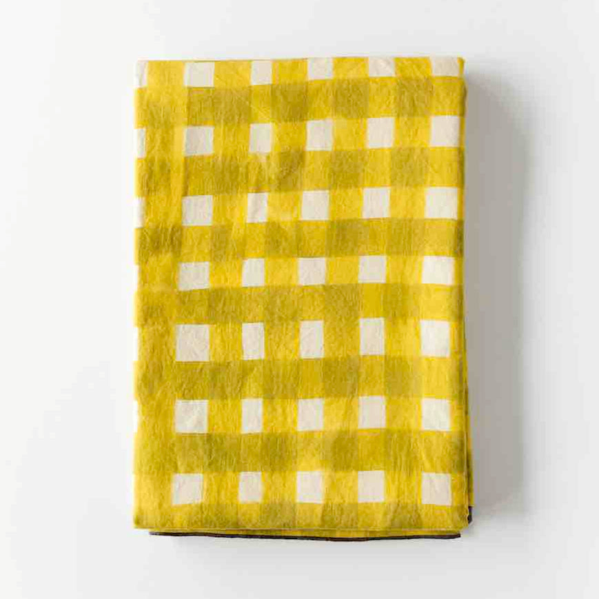 Yellow Cross-Hatch linen tablecloth styled on spring dining table - Goldie Home