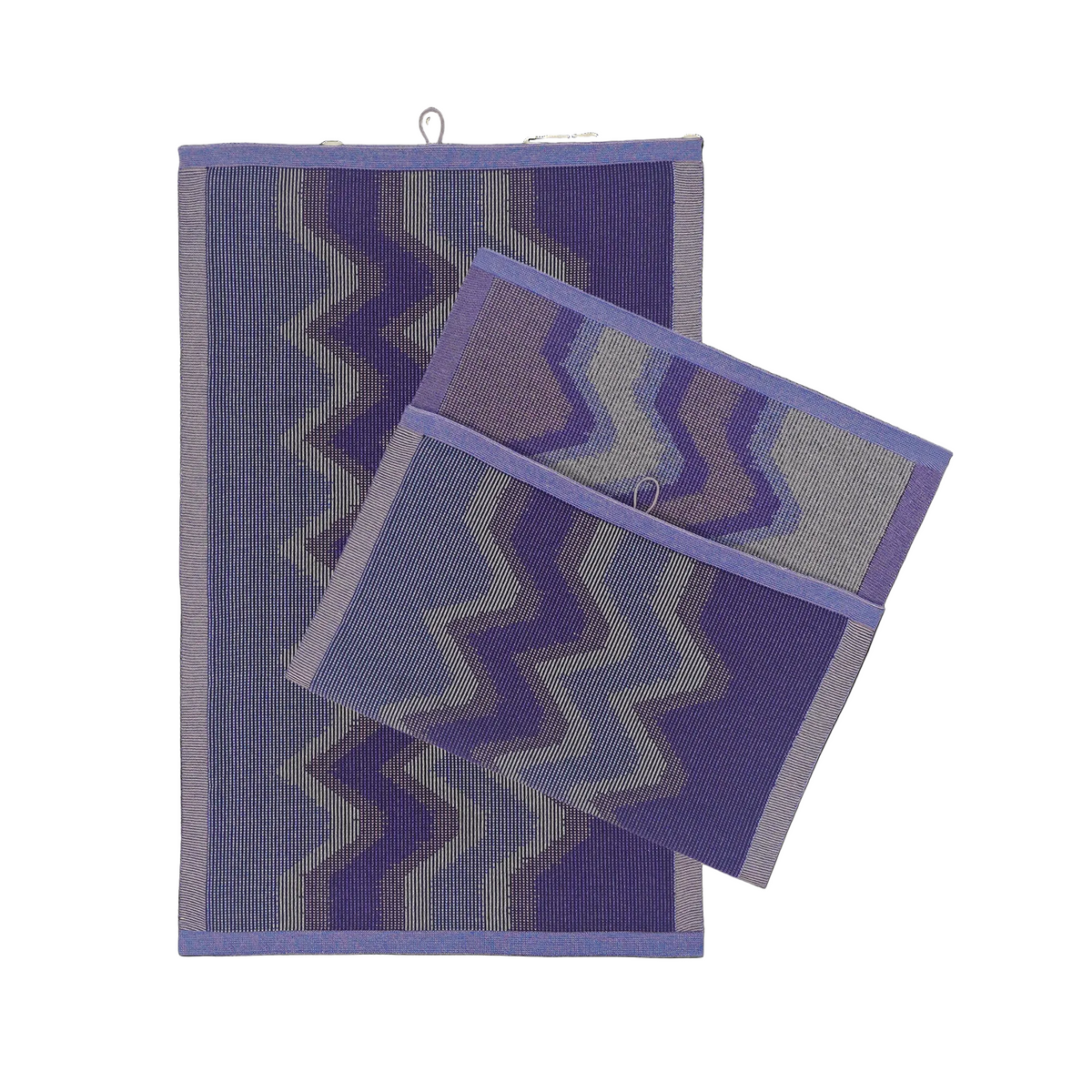front view of purple knit organic cotton kitchen towel set with zig zag pattern