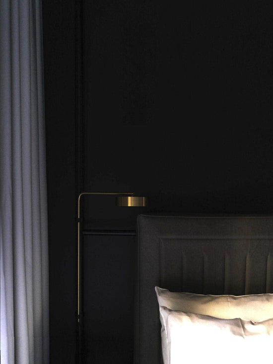 James Floor Lamp beside bed