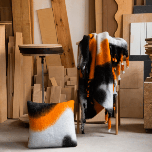 Viso Mohair Blanket White, Orange and Black Pattern lifestyle