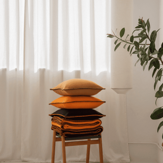 Viso Merino Pillow Camel on stool