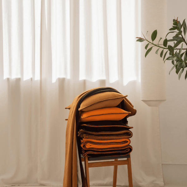 Viso Merino Pillow Camel on stool