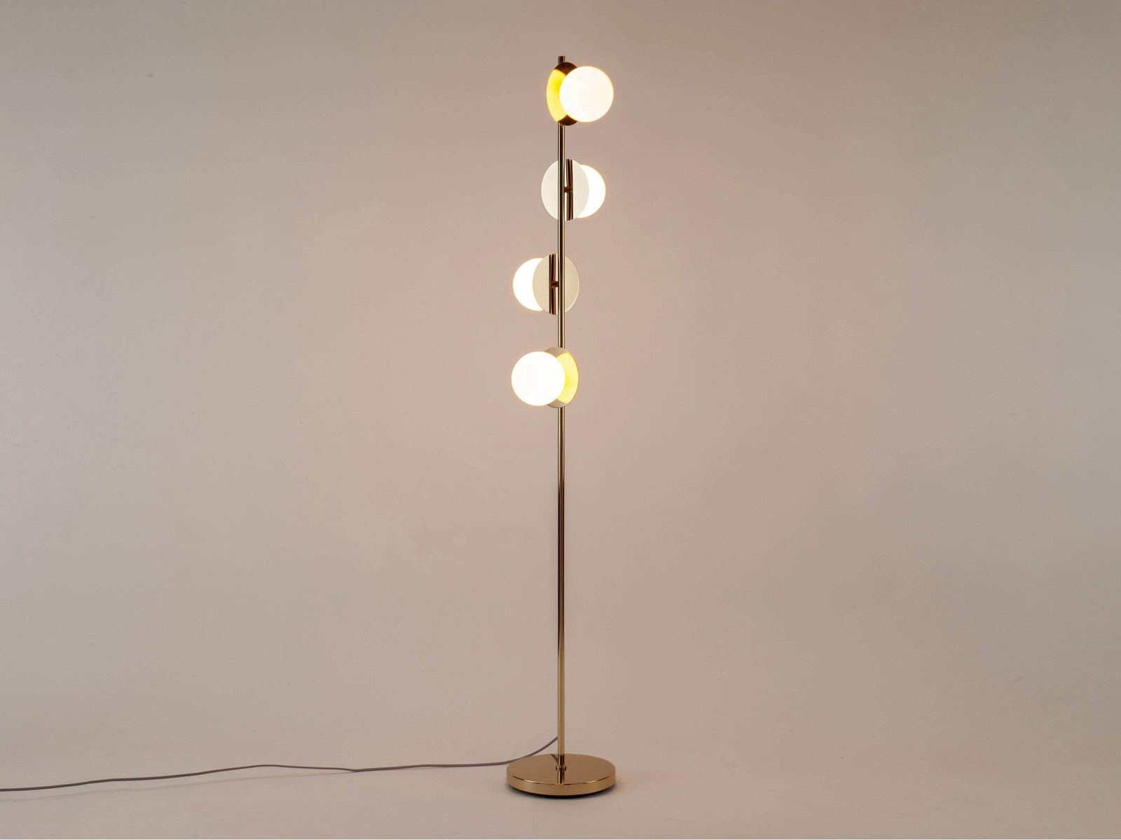 Brass opal disk floor lamp
